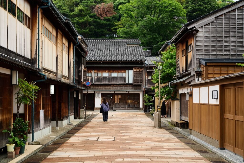 Quiet traditional street in Kanazawa, Japan with historic wooden architecture.